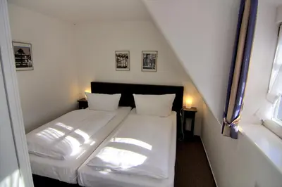 Ein Bett oder Betten in einem Zimmer der Unterkunft Apartment mit Balkon No5