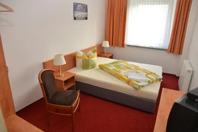 Ein Bett oder Betten in einem Zimmer der Unterkunft Haus Sankt Florian