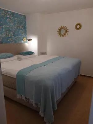 Ein Bett oder Betten in einem Zimmer der Unterkunft Kleines Refugium