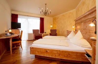 Ein Bett oder Betten in einem Zimmer der Unterkunft Harzhotel Zum Prinzen