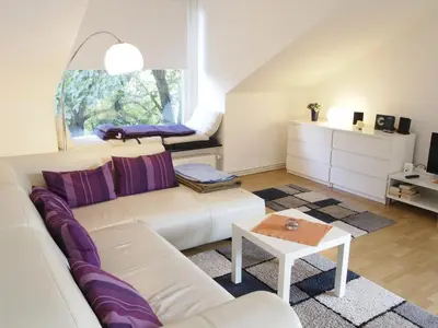 Ein Sitzbereich in der Unterkunft Ferienwohnung Bummelallee