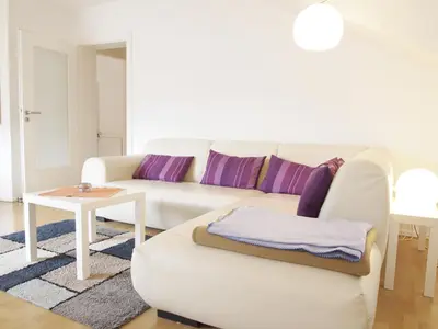 Ein Sitzbereich in der Unterkunft Ferienwohnung Bummelallee