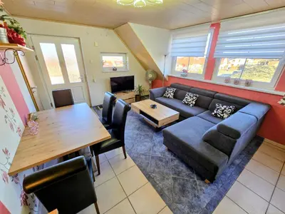 Ein Sitzbereich in der Unterkunft Apartment Am Horstberg