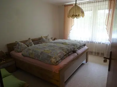 Ein Bett oder Betten in einem Zimmer der Unterkunft Ferienwohnung Kurparkblick