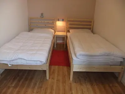 Ein Bett oder Betten in einem Zimmer der Unterkunft HausJägerborn