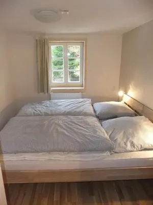 Ein Bett oder Betten in einem Zimmer der Unterkunft HausJägerborn