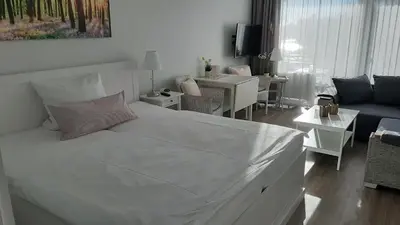 Ein Bett oder Betten in einem Zimmer der Unterkunft Seaside Appartement 458 Vier Jahreszeiten
