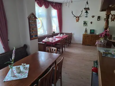 Ein Sitzbereich in der Unterkunft Pension Bodetal