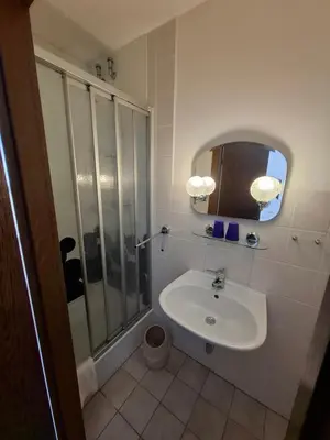 Ein Badezimmer in der Unterkunft Pension Bodetal