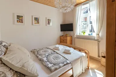 Ein Bett oder Betten in einem Zimmer der Unterkunft An der Gose - Gästezimmer & Appartement