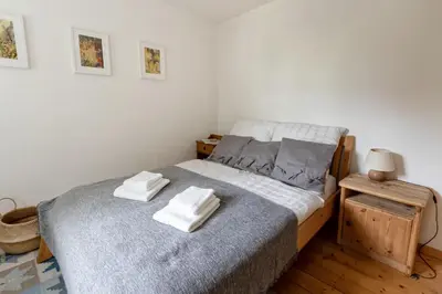 Ein Bett oder Betten in einem Zimmer der Unterkunft An der Gose - Gästezimmer & Appartement