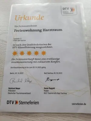 Ein Zertifikat, Auszeichnung, Logo oder anderes Dokument, das in der Unterkunft Ferienwohnung Harztraum ausgestellt ist