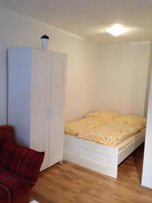 Ein Bett oder Betten in einem Zimmer der Unterkunft Apartments Gosch Braunlage