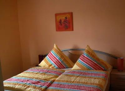 Ein Bett oder Betten in einem Zimmer der Unterkunft Ferienwohnung Köhler