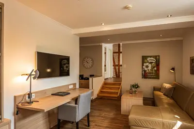 Ein Sitzbereich in der Unterkunft City-Appartements Am Wall