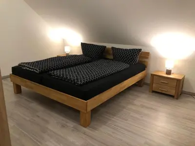 Ein Bett oder Betten in einem Zimmer der Unterkunft Harzer Fitnessloft
