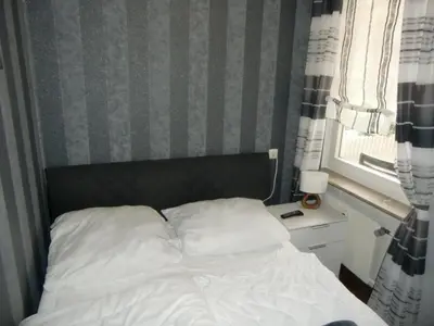 Ein Bett oder Betten in einem Zimmer der Unterkunft Schickeria