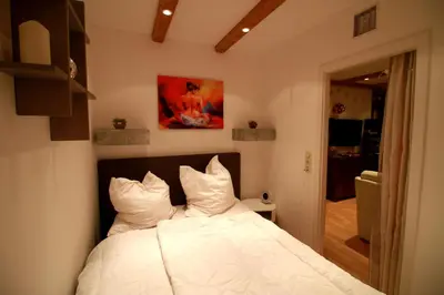 Ein Bett oder Betten in einem Zimmer der Unterkunft App 622 Panoramic Hohegeiß mit WLan Terrassenhaus