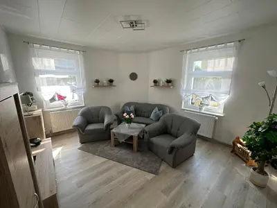 Ein Sitzbereich in der Unterkunft Ferienwohnung Hosang