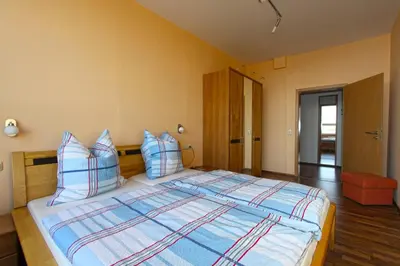 Ein Bett oder Betten in einem Zimmer der Unterkunft Ferienwohnungen mit Weitblick