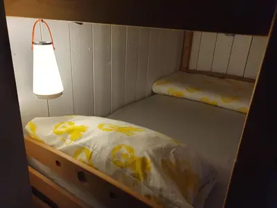 Ein Bett oder Betten in einem Zimmer der Unterkunft Luchshütte