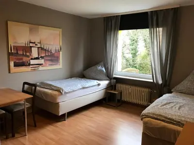 Ein Bett oder Betten in einem Zimmer der Unterkunft Ferienwohnung Serin