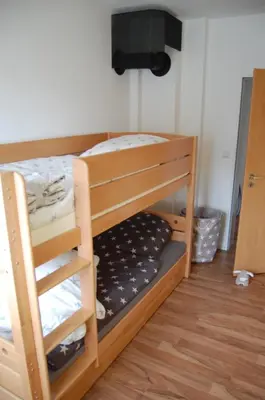Ein Bett oder Betten in einem Zimmer der Unterkunft Harz Haus Kati - Fewo Talblick