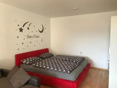 Ein Bett oder Betten in einem Zimmer der Unterkunft Frau Holle