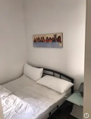 Ein Bett oder Betten in einem Zimmer der Unterkunft Frau Holle