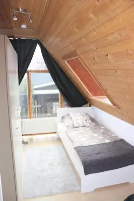 Ein Bett oder Betten in einem Zimmer der Unterkunft Ferienhaus Geli