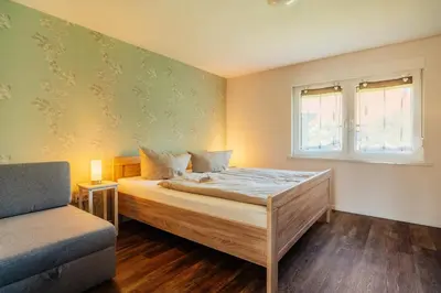 Ein Bett oder Betten in einem Zimmer der Unterkunft Villa Waldnest