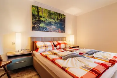 Ein Bett oder Betten in einem Zimmer der Unterkunft Wurmberg Baude 2