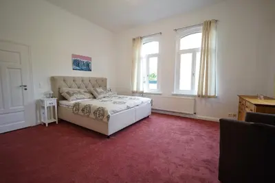 Ein Bett oder Betten in einem Zimmer der Unterkunft Ferienhaus Clorinda