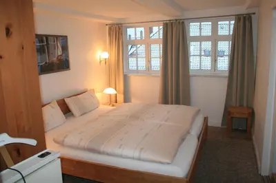 Ein Bett oder Betten in einem Zimmer der Unterkunft Fachwerkferienhaus Helmbrecht