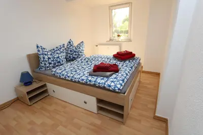 Ein Bett oder Betten in einem Zimmer der Unterkunft Ferienwohnung Both