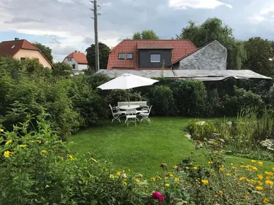 Ein Garten an der Unterkunft Schöne gemütliche Ferienwohnung mit Kamin I im Harz