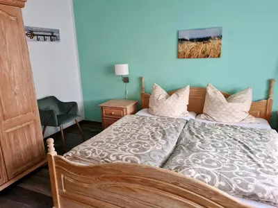 Ein Bett oder Betten in einem Zimmer der Unterkunft Ravensbergblick - harzlich willkommen in Bad Sachsa