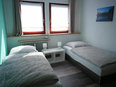 Ein Bett oder Betten in einem Zimmer der Unterkunft Ravensbergblick - harzlich willkommen in Bad Sachsa