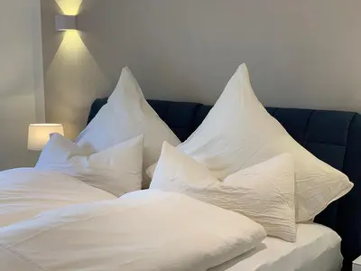 Ein Bett oder Betten in einem Zimmer der Unterkunft Harzfewo Köhnke 7