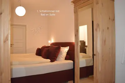 Ein Bett oder Betten in einem Zimmer der Unterkunft Gröperntorhaus
