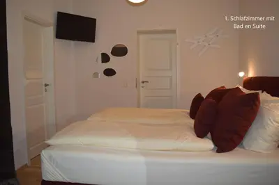 Ein Bett oder Betten in einem Zimmer der Unterkunft Gröperntorhaus