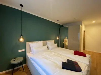 Ein Bett oder Betten in einem Zimmer der Unterkunft Braunlage Lodge