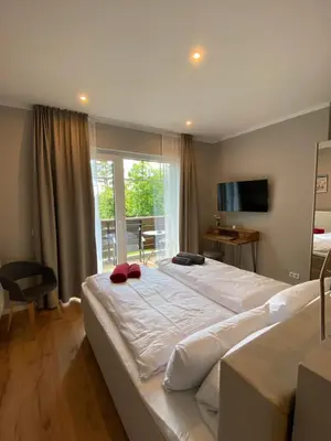 Ein Bett oder Betten in einem Zimmer der Unterkunft Braunlage Lodge