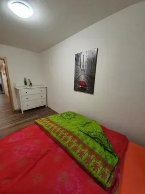 Ein Bett oder Betten in einem Zimmer der Unterkunft Eddy's Stadt Stübchen
