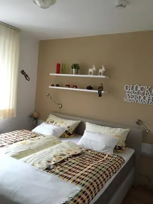 Ein Bett oder Betten in einem Zimmer der Unterkunft FeWo Inge Reiter