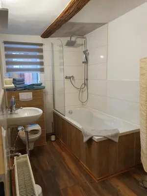 Ein Badezimmer in der Unterkunft Eddy's Stadt Appartement