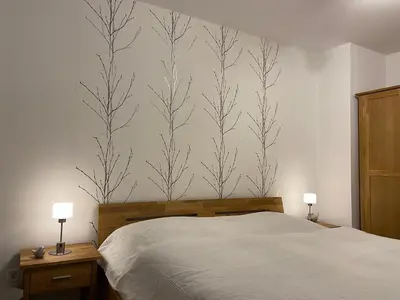 Ein Bett oder Betten in einem Zimmer der Unterkunft Ferienhaus Kleine Auszeit
