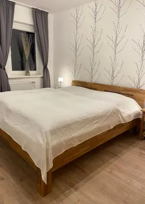 Ein Bett oder Betten in einem Zimmer der Unterkunft Ferienhaus Kleine Auszeit