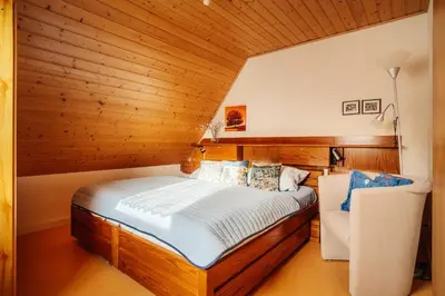 Ein Bett oder Betten in einem Zimmer der Unterkunft JermersteinSonne