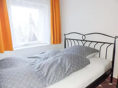 Ein Bett oder Betten in einem Zimmer der Unterkunft Stilvolles Ferienhaus Artdeco